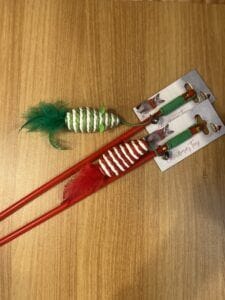 Ca&ntilde;a de pescar con rat&oacute;n y pluma